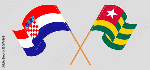 Crossed and waving flags of Croatia and Togo