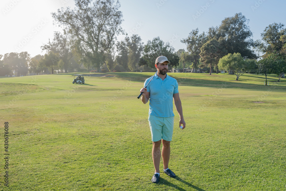 Man golfer playing golf on a golf course. Man golfer playing golf on a golf course.