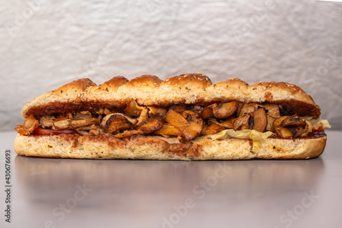 sandwich with mushroom filling in a crispy bun