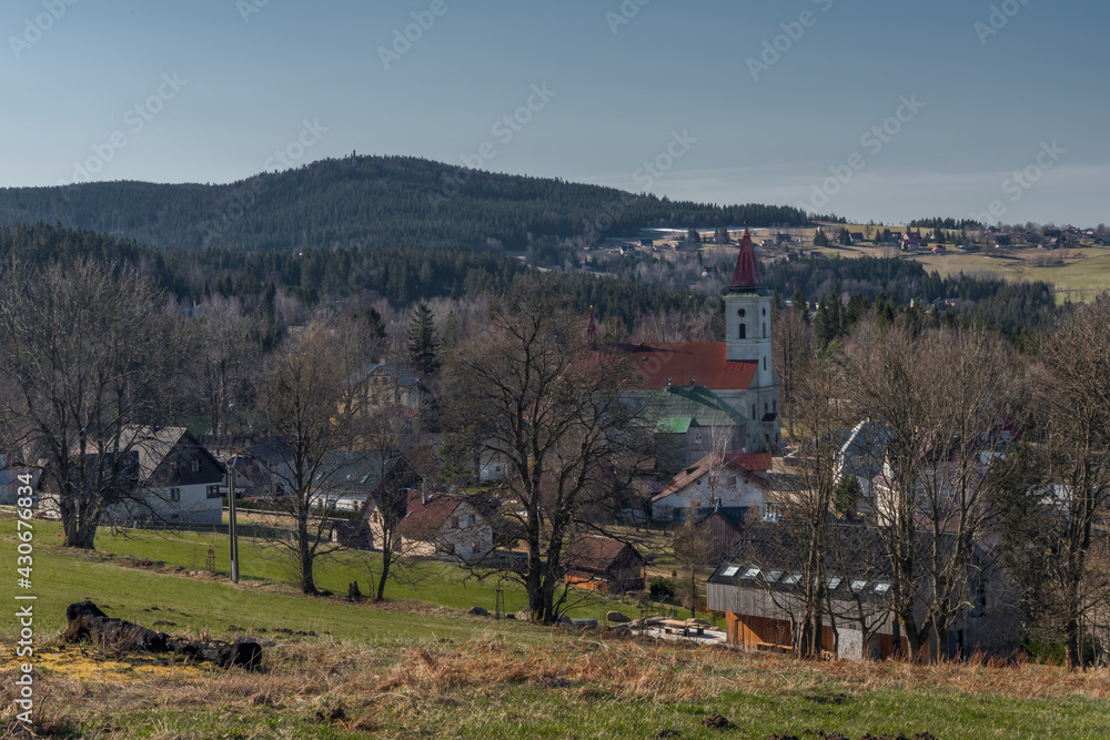 View over Horny Polubny village in Jizerske mountains in green spring sunny day View over Horny Polubny village in Jizerske mountains in green spring sunny day