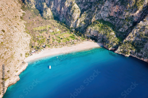Sea coast aerial landscape of cliffs in Butterfly valley in Turkey  amazing natural beach