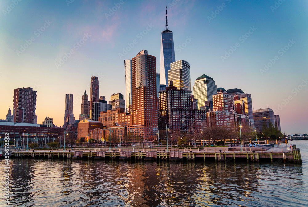 Fototapeta premium city skyline at sunrise New York beautiful cute views summer reflections buildings marina 