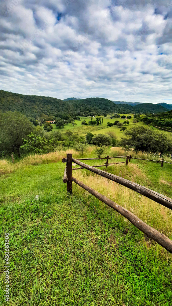 Wooden fence on the hills