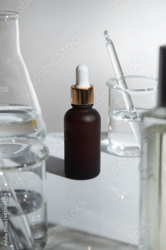science experiment mockup of beauty fashion cosmetic makeup bottle lotion product with skincare healthcare concept on background