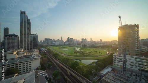 Time lapse of aerial view of The Royal Bangkok Sports Club in Ratchadamri, Bangkok Downtown Skyline. Thailand. Financial district in smart urban city in Asia. Skyscraper and high-rise buildings. photo