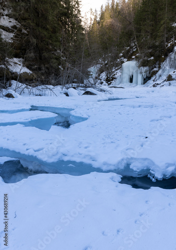 Ice cave called Iskjørkja on the Tromsaelva River, near the village of Fåvang, Norway © Dreamnordno