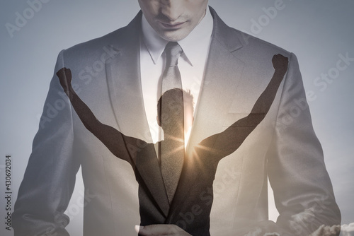 Strong young motivated man finding inner strength and power. 