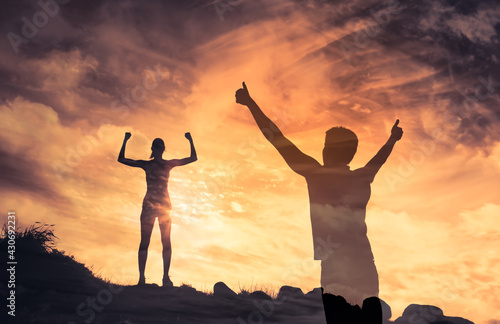 Strong fit healthy man and woman feeling positive, and physically strong. Mind body and spirt concept. 