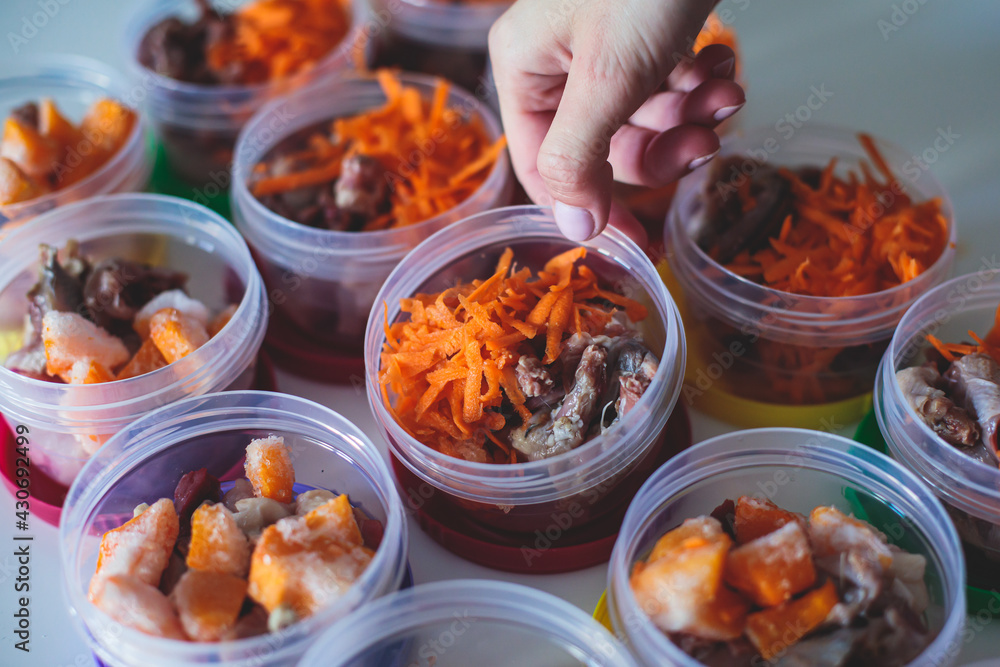 Process of preparing bowls with natural raw pet dog food at home