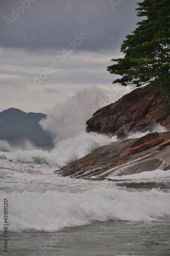 waves crashing on rocks