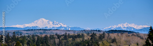 Majestic Mount Baker and Three Fingers dominate White Rock's skyline.