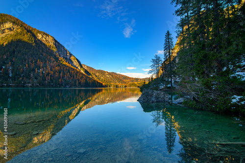 The beautiful Braies lake in late autumn with a little snow, Pearl of the Dolomite lakes is an UNESCO heritage and is located in the Braies Alto Adige,Italy