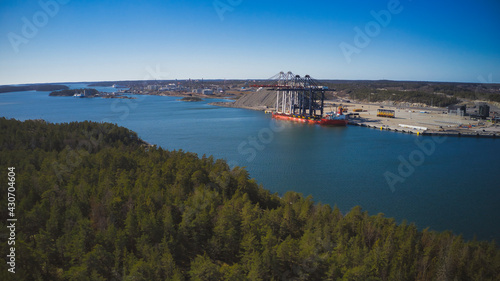 Stockholm Norvik Port, Sweden, 2020-03-18: Aerial view of installing new cranes, shipped from China to Sweden. High quality photo