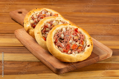 Arabic meat sfiha on the table.