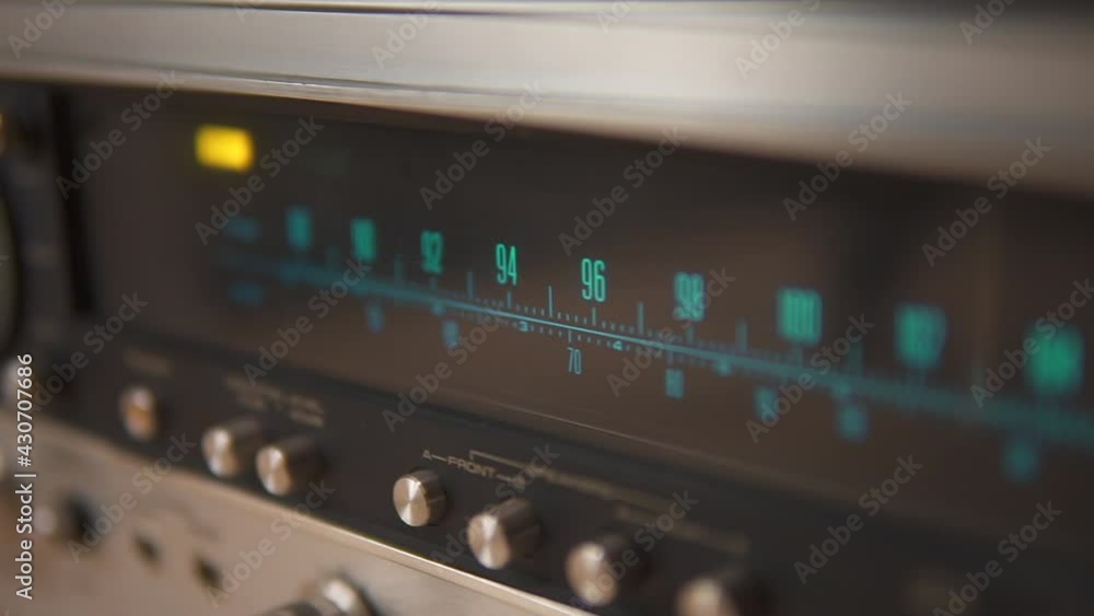Panning over the radio frequencies available on the old, retro amplifier Panning over the radio frequencies available on the old, retro amplifier