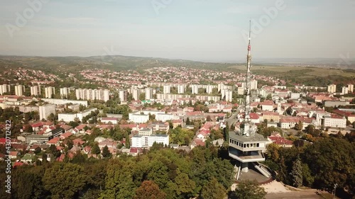 Cinematic aerial drone orbiting footage of the Avas TV Tower in Miskolc, fourth largest city and a major industrial hub, Northern regional center of Hungary, capital of Borsod-Abaúj-Zemplén county photo