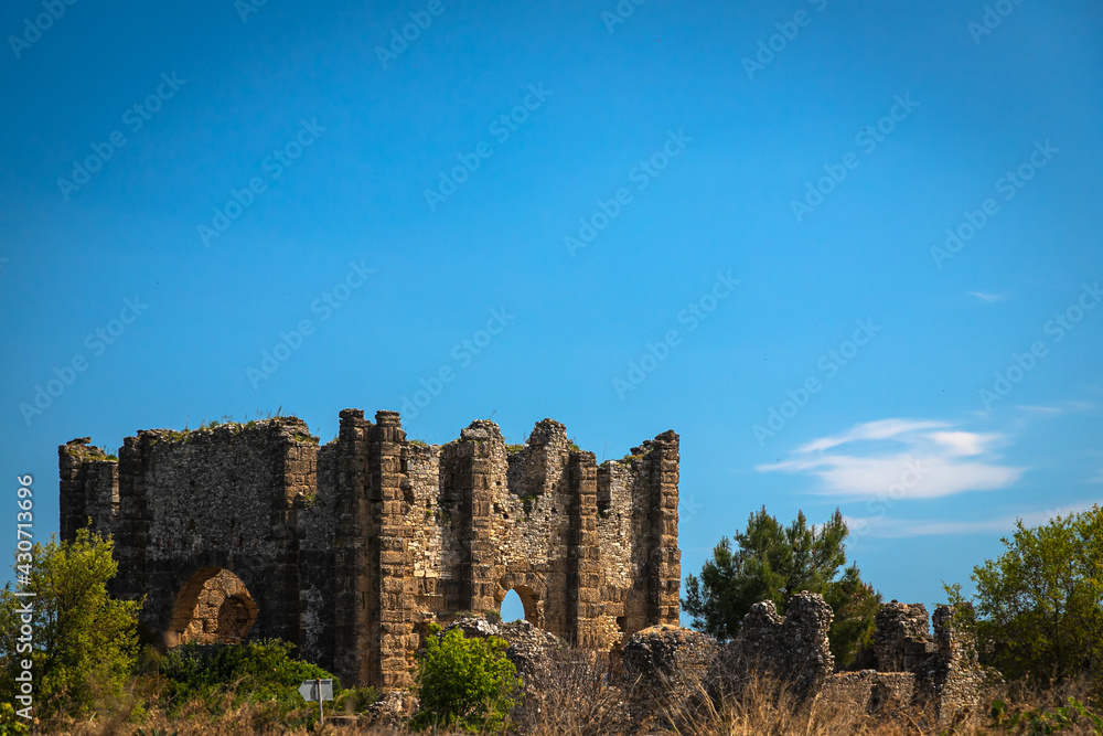 An antique ruined house  ruin city. Basilica, dating from the 3rd century AD, at Aspendos ancient site in Turkey.