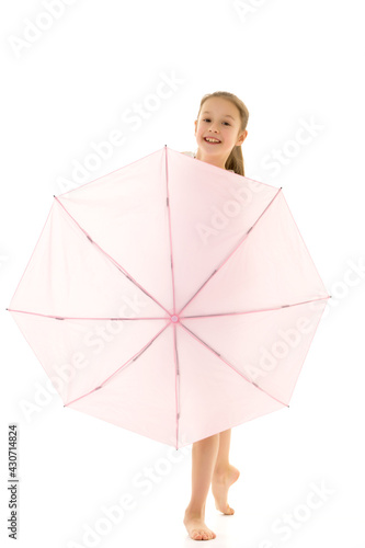 Little girl with umbrella.Concept style and fashion. Isolated on white background. © lotosfoto