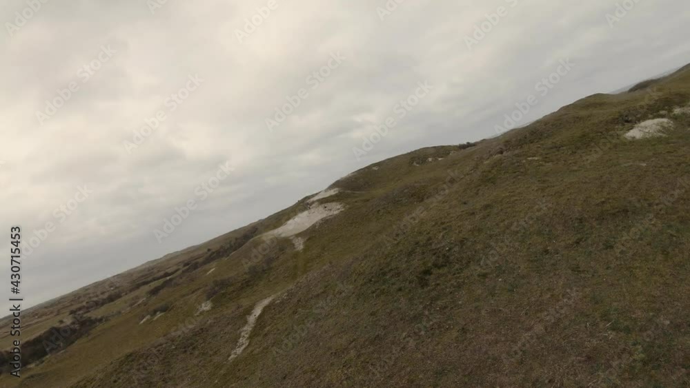 Dunes Covered With Grass In National Park At Waddensea Texel Island In North Holland, Netherlands. - Drone, POV, FPV Dunes Covered With Grass In National Park At Waddensea Texel Island In North Holland, Netherlands. - Drone, POV, FPV