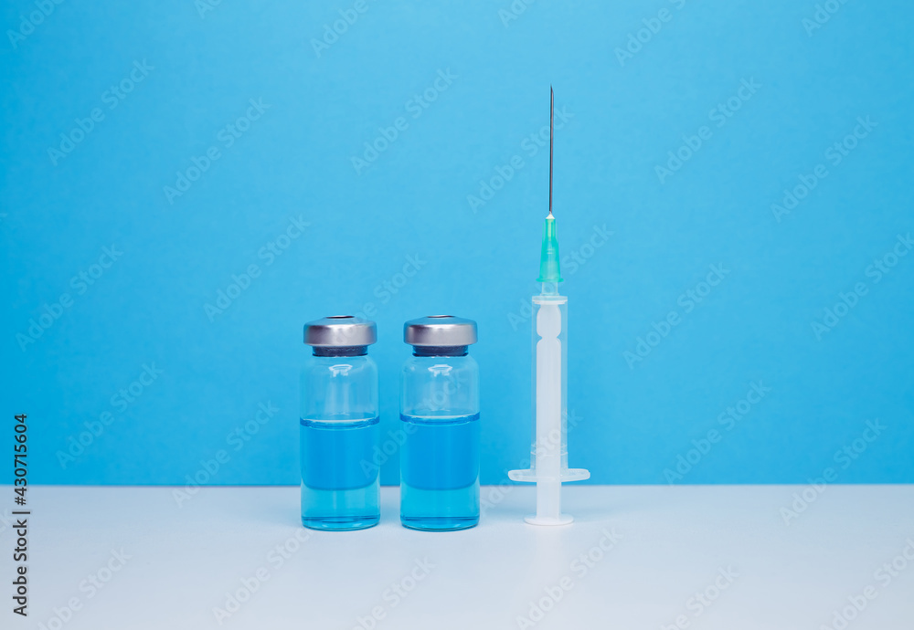 Healthy immune system. Virus germs and bacteria protection. Vaccine for vaccination, medical immunization for patient treatment from disease. Professional administering a flu vaccine. Sterile vial Healthy immune system. Virus germs and bacteria protection. Vaccine for vaccination, medical immunization for patient treatment from disease. Professional administering a flu vaccine. Sterile vial