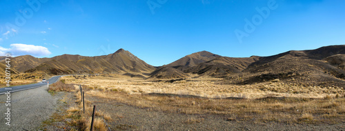Panoramic image of country road and mountain range Road in Lindis Pass, Otago region, New Zealand
