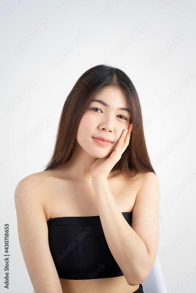 Portrait of beautiful asian woman makeup of cosmetic, girl hand touch cheek and smile attractive, face of beauty perfect with wellness isolated on white background with skin healthcare concept. Portrait of beautiful asian woman makeup of cosmetic, girl hand touch cheek and smile attractive, face of beauty perfect with wellness isolated on white background with skin healthcare concept.