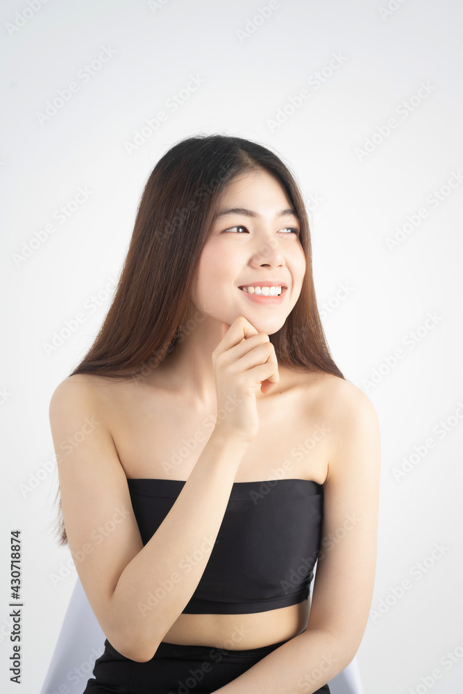 Portrait of beautiful asian woman makeup of cosmetic, girl hand touch cheek and smile attractive, face of beauty perfect with wellness isolated on white background with skin healthcare concept. Portrait of beautiful asian woman makeup of cosmetic, girl hand touch cheek and smile attractive, face of beauty perfect with wellness isolated on white background with skin healthcare concept.