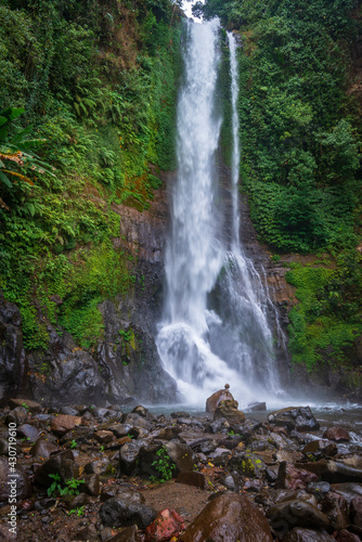Gitgit waterfall in jungles of Bali island, Indonesia