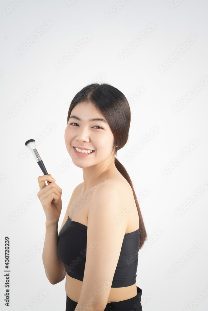 Portrait of beautiful asian woman makeup of cosmetic, girl hand touch cheek and smile attractive, face of beauty perfect with wellness isolated on white background with skin healthcare concept. Portrait of beautiful asian woman makeup of cosmetic, girl hand touch cheek and smile attractive, face of beauty perfect with wellness isolated on white background with skin healthcare concept.