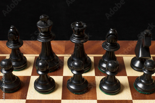 Chess piece over chessboard