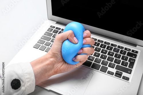 Female hand squeezing stres...