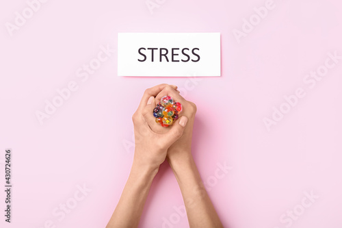 Female hand squeezing stres...