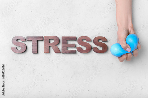 Female hand squeezing stres...