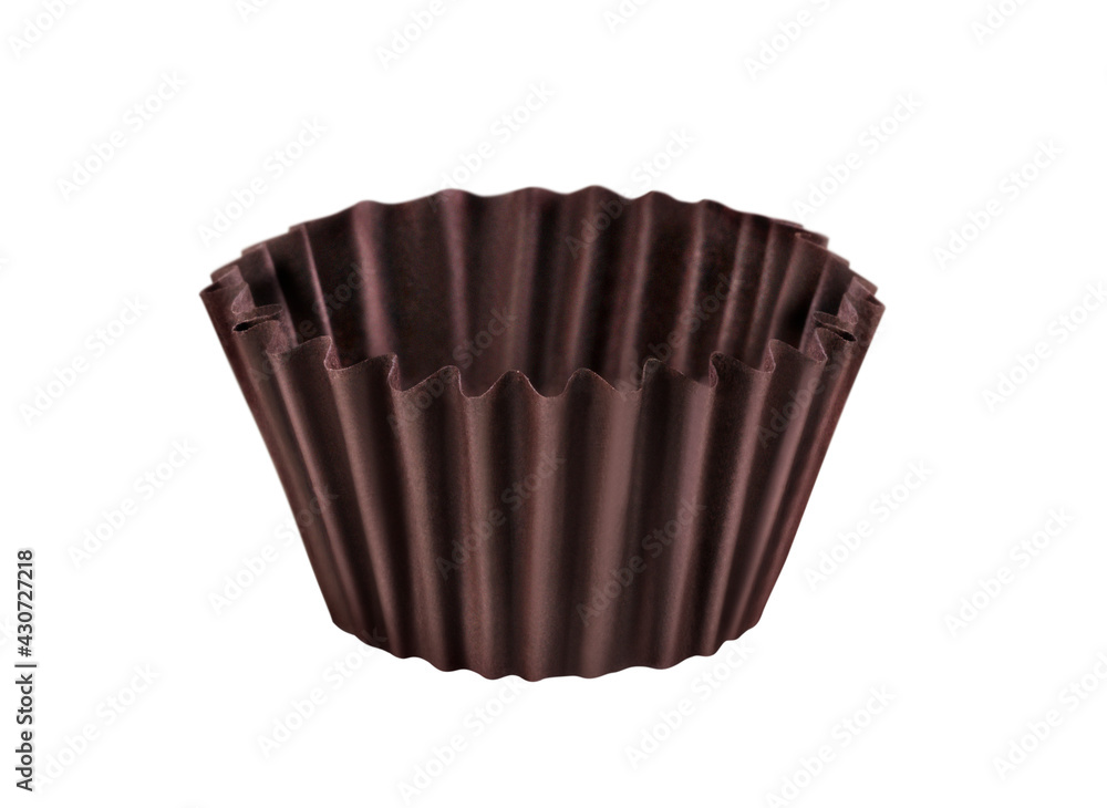 Brown muffin cup isolated on white background Brown muffin cup isolated on white background