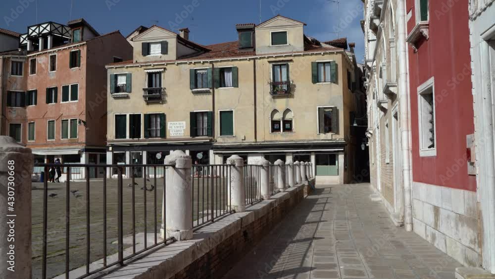 Venice, Italy - April 2021 - Walking through the less touristy streets of the lagoon city, among lesser-known canals, bridges and houses Venice, Italy - April 2021 - Walking through the less touristy streets of the lagoon city, among lesser-known canals, bridges and houses