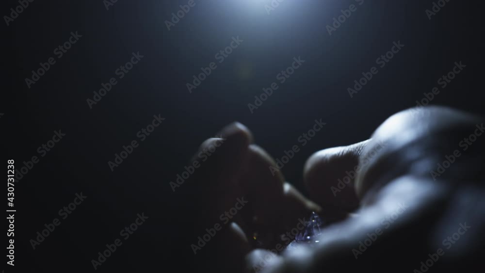 Diamond in mans hand on a black background. HODLER with Diamond hands, Crypto Diamond in mans hand on a black background. HODLER with Diamond hands, Crypto