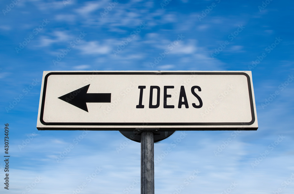 Ideas white road sign with arrow on blue sky background. One way road sign with copy space. Arrow on a pole pointing in one direction. Concept, notion, message, intention, brainchild, representation Ideas white road sign with arrow on blue sky background. One way road sign with copy space. Arrow on a pole pointing in one direction. Concept, notion, message, intention, brainchild, representation