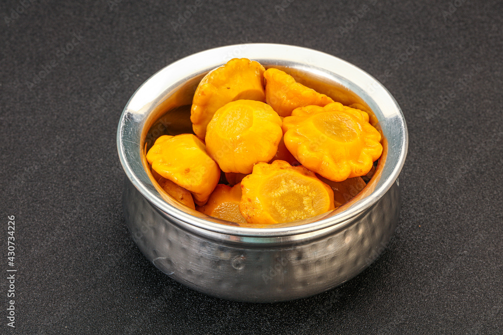 Marinated yellow patisson in the bowl Marinated yellow patisson in the bowl