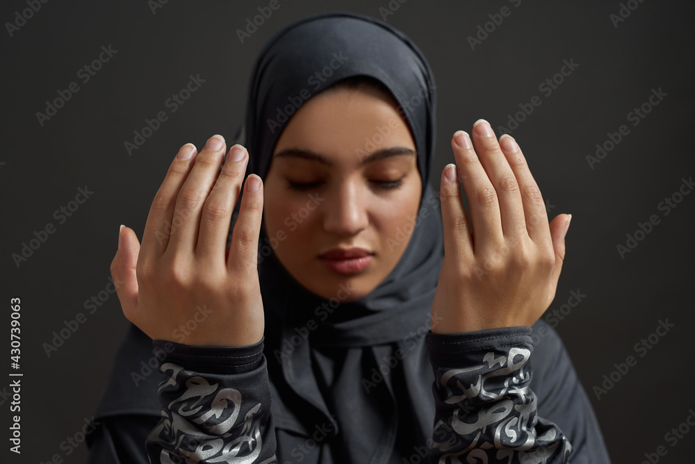 Selective focus on bare hands of young arabian woman Selective focus on bare hands of young arabian woman