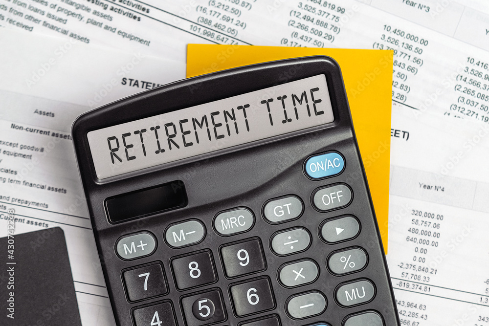 On display of calculator is written RETIREMENT TIME On display of calculator is written RETIREMENT TIME