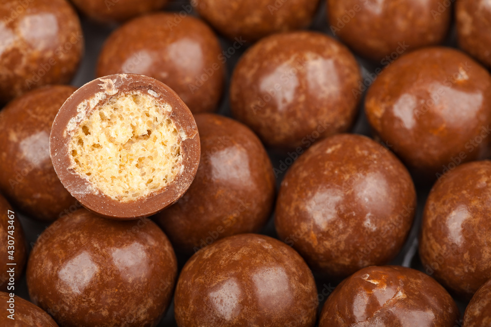 Close up of chocolate candy balls. Confectionery textered background Close up of chocolate candy balls. Confectionery textered background