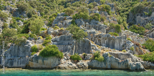 Fototapeta Naklejka Na Ścianę i Meble -   Kekova is an island keeps under water the ruins of 4 ancient cities, that fell into the water in the II century BC as a result of an earthquake