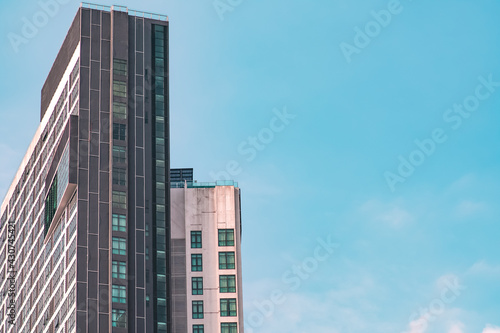 Modern building with blue windows close up