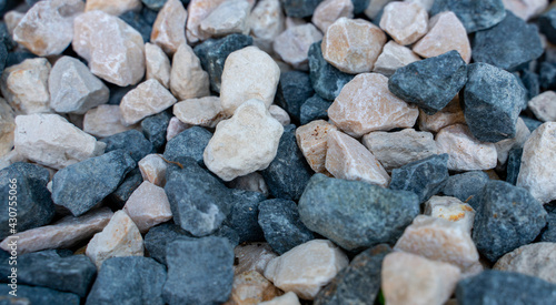 Crushed decorative garden pebbles with the mix of blue and gray.