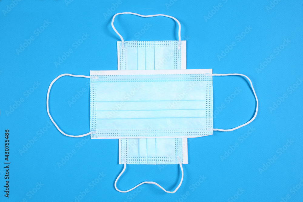 gay couple concept: two light blue medical face mask with copy space for your text gay couple concept: two light blue medical face mask with copy space for your text