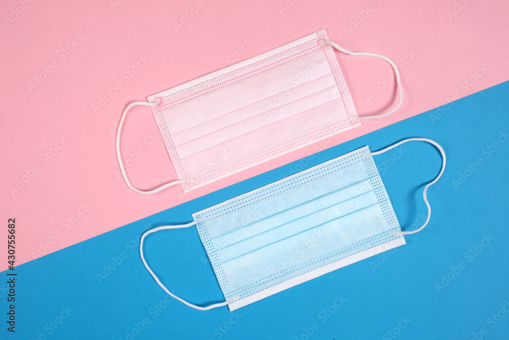 couple concept: pink and light blue face medical with copy space for your text couple concept: pink and light blue face medical with copy space for your text