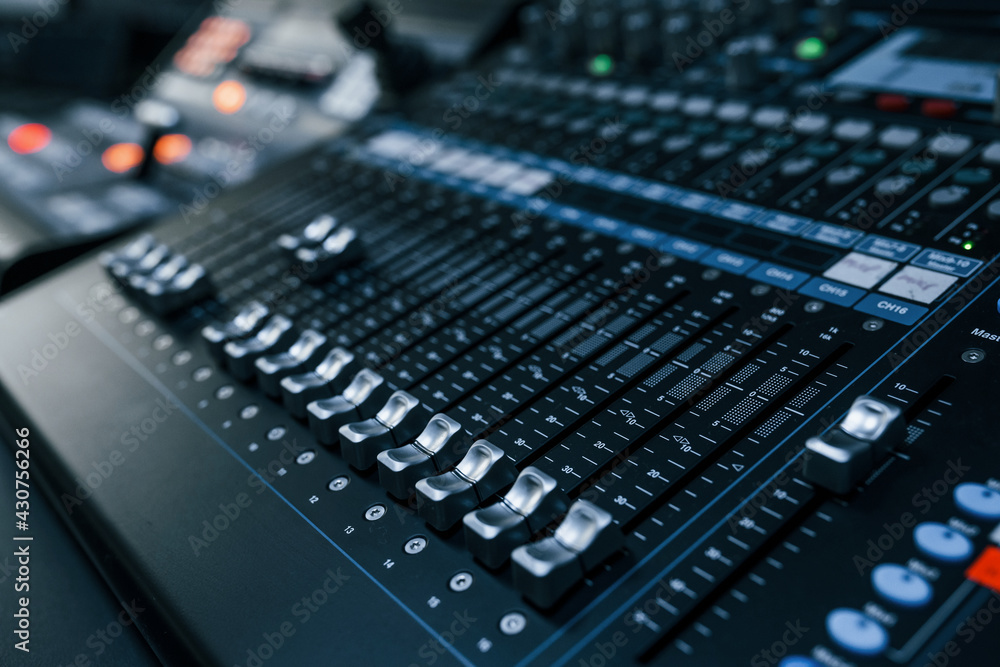Close up view of radio mixing desk with professional sound equipment Close up view of radio mixing desk with professional sound equipment