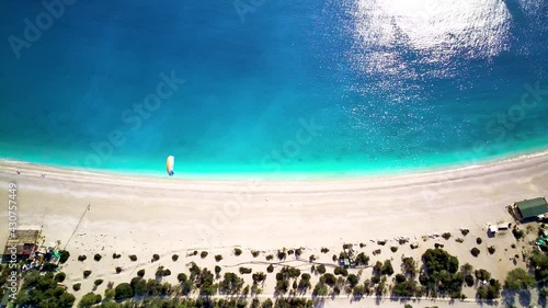 Amazing high angle top drone view on world famous paragliding and parasailing turkish spot for extrim parachute sport in Oludeniz in Fethiye, Turkey
