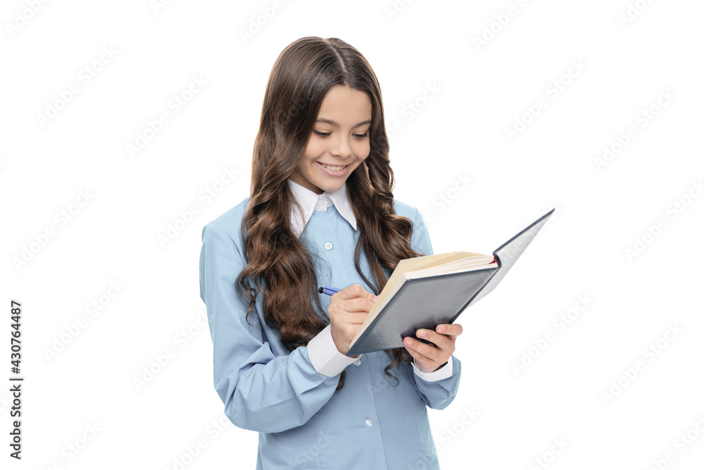 Happy kid do school assignment in writing in study book isolated on white vitage filter, retro Happy kid do school assignment in writing in study book isolated on white vitage filter, retro