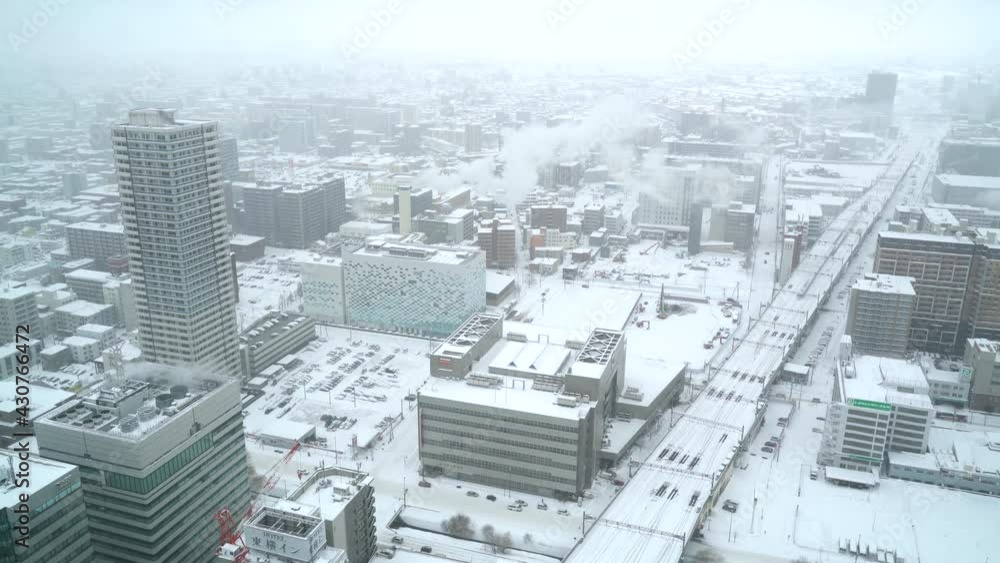 Snowed in industrial city during winter. Urban cityscape Snowed in industrial city during winter. Urban cityscape